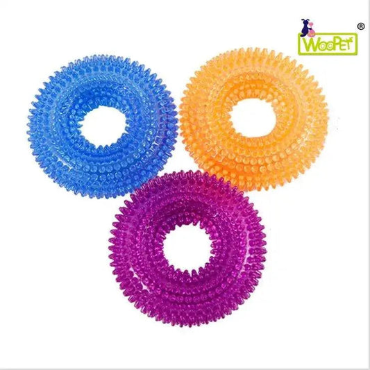 Dog squeaky toy from Fetch & Purr designed for teeth cleaning, made of durable pet-safe material with a squeaker inside.
