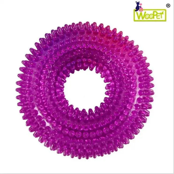 Dog squeaky toy from Fetch & Purr designed for pet tooth cleaning, featuring durable material and playful design.